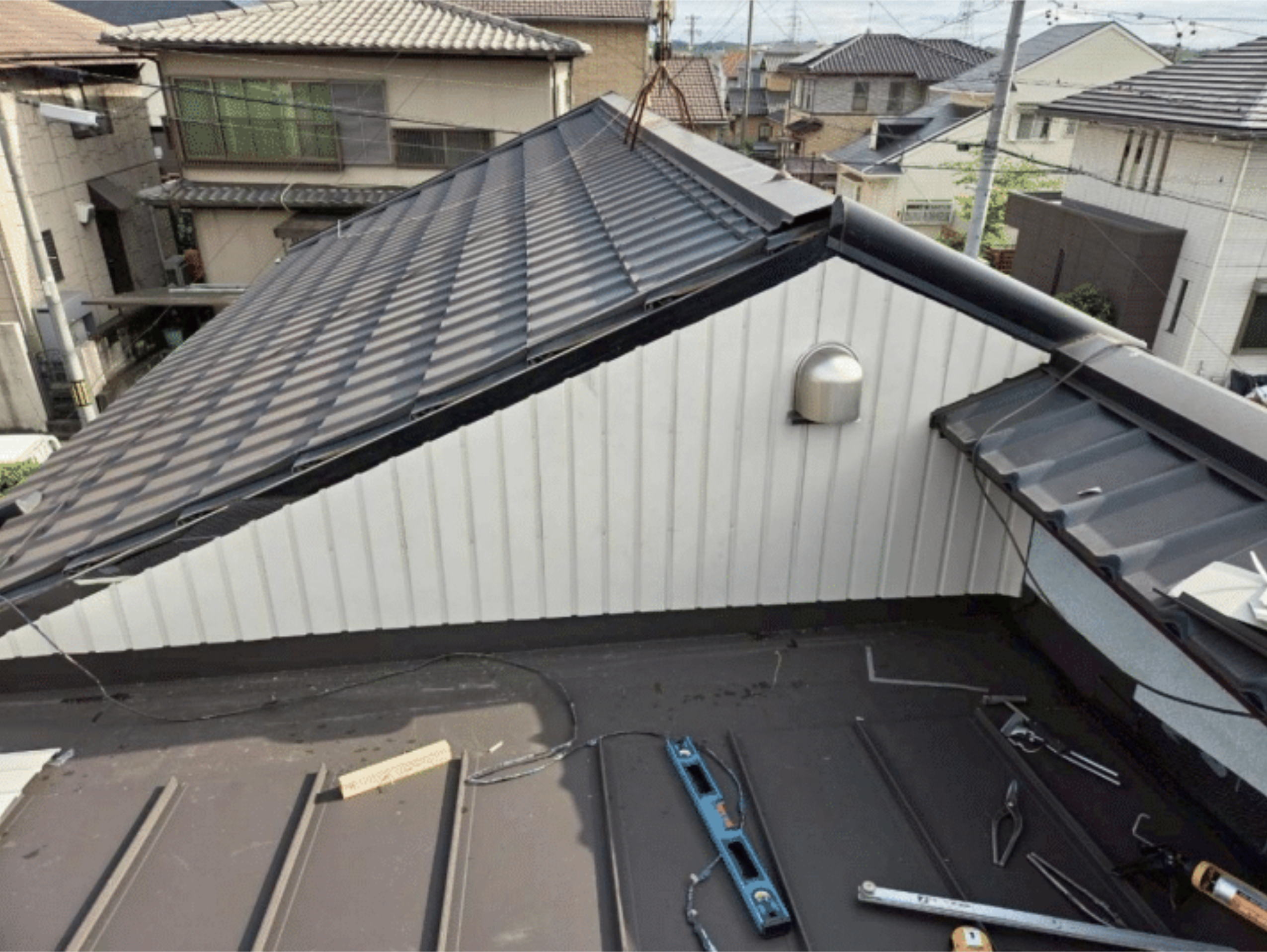外壁・換気口の新設納め作業